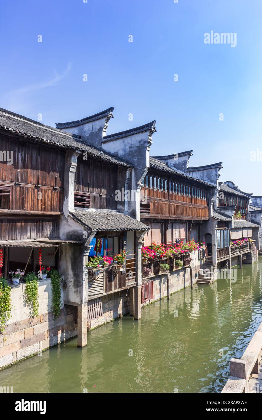 Balconies with flowers at the Dongshi river in Wuzhen, China Stock Photo