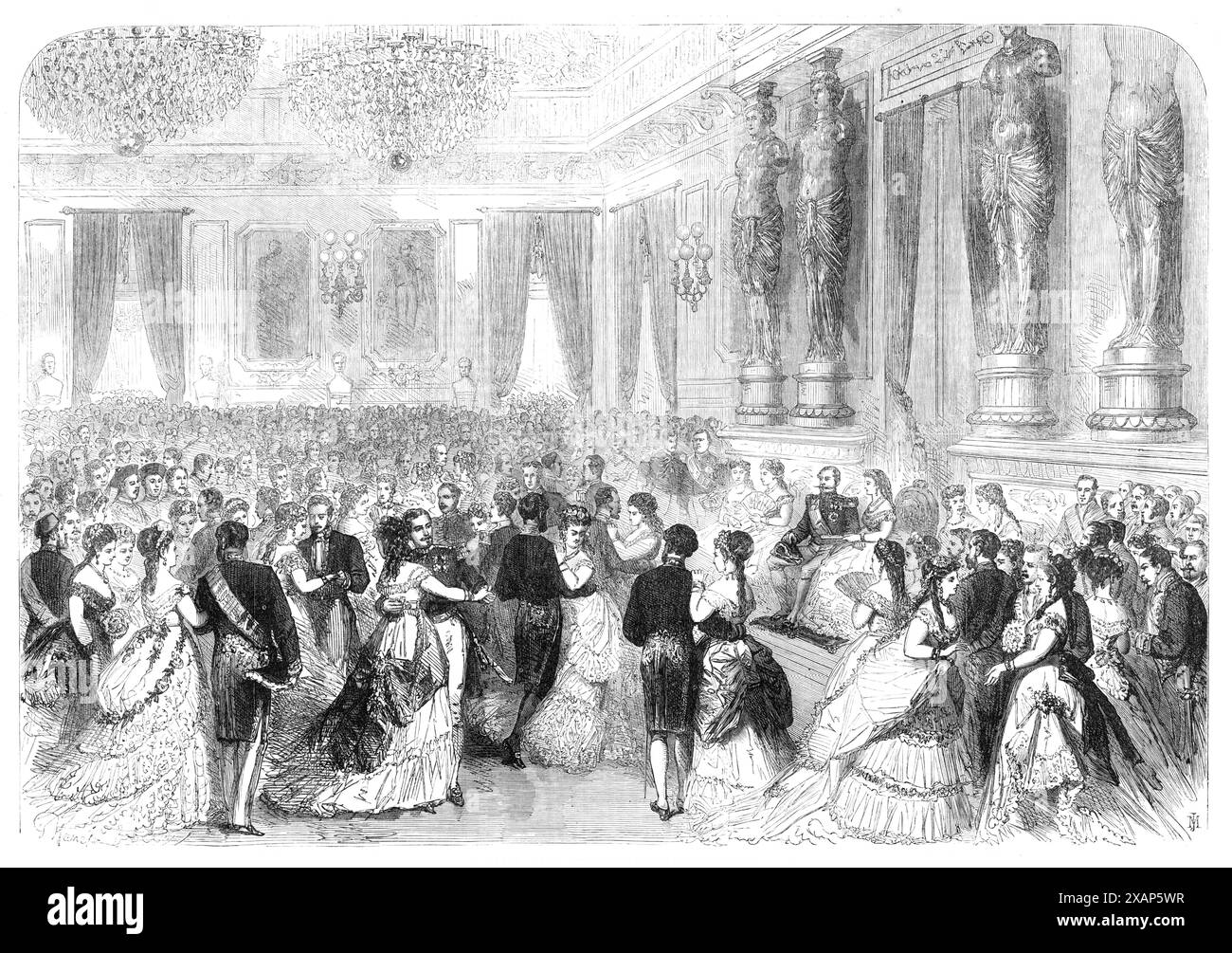 State Ball at the Tuileries [Palace, in Paris]: presentations to the Emperor and Empress before the Ball, 1869. 'The ball...takes place in the Salle des Marechaux, a vast saloon...This hall is the largest in the Tuileries ; but, despite its size, the crowd is frequently so great that dancing becomes an impossibility, though numerous chamberlains in scarlet uniforms, and ushers with their necks encircled by chains of massy silver, are continually doing their utmost to maintain a clear space...The quadrille of honour, the persons taking part in which are always designated by the Emperor, is usua Stock Photo