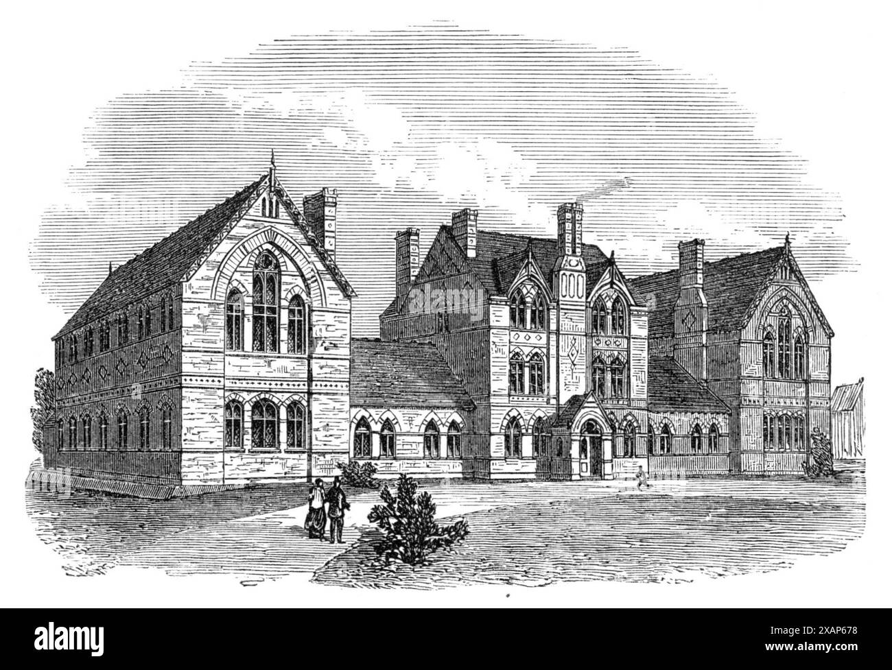 Home for Destitute Boys, Bisley, Surrey, 1869. An industrial '...farm-school...for the reformation and employment of the destitute and homeless boys of London...Last year there were gathered from the streets into the refuge no less than 350 boys, and still they come begging to be received...The building...is Early Gothic, and consists of a centre and two wings, connected by corridors. The centre contains committee-rooms, store-rooms, living-room for the master, and separate infirmaries. The west wing contains workshops for several departments, and over these is a fine spacious dormitory...In t Stock Photo