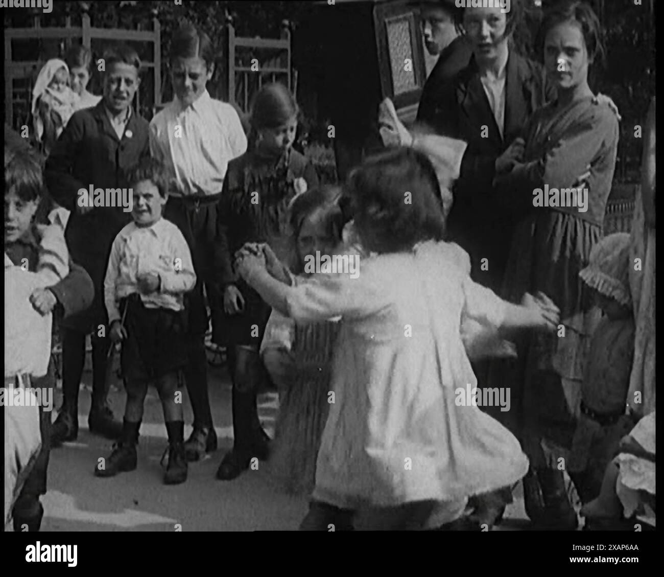 Childhood dancing musical instrument crowd hi-res stock photography and