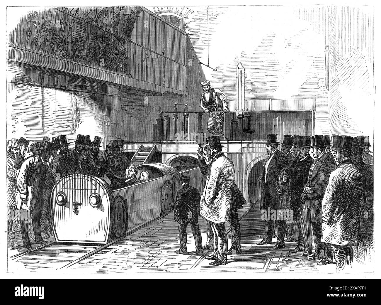 The Pneumatic Despatch Tube: the Holborn end of the Tube on the opening day, 1865. Inauguration of a 'conveyance by atmospheric propulsion through a tube', for the delivery of mail-bags 'from and to the postal headquarters in London...[and] between the different railway termini and goods d&#xe9;p&#xf4;ts...connecting with these lines the six principal London markets and other important points...The Duke of Buckingham, Chairman of the Pneumatic Despatch Company, had invited a number of scientific gentlemen to inspect the apparatus. After the train had made some successful passages to and fro, s Stock Photo