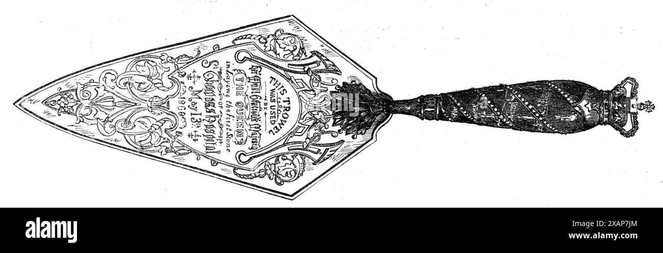 Trowel used by the Queen in laying the first stone of the new St. Thomas's Hospital, [in London], 1868. 'The trowel used by her Majesty [Queen Victoria] was a most artistic and elegant specimen of goldsmith's work, in the pure Italian style. The handle was of rock crystal, inlaid with scrolls of gold and turquoises, and surmounted by the Royal crown in chased gold, set with precious stones, the arched diadems being jewelled with pearls. The blade, which is of silver, bears the inscription: &quot;This Trowel was used by her Most Gracious Majesty the Queen in Laying the First Stone of St. Thomas Stock Photo