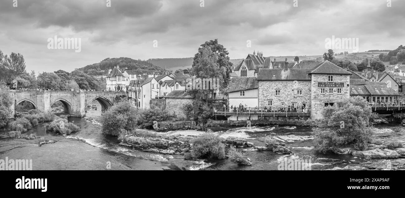 Llangollen Bridge is built across the River Dee on the High street in the Welsh town of Llangollen listed as one of the seven wonders of Wales. Stock Photo