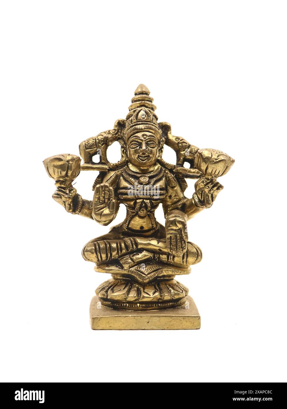 clean brass statue of goddess laxmi with multiple hands, used for