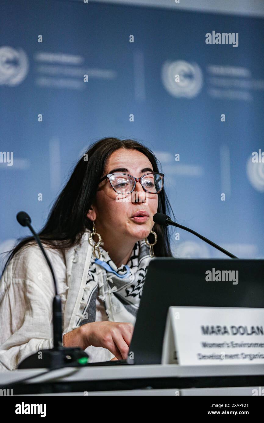 Bonn, Germany, Germany. 7th June, 2024. MARA DOLAN of Women's environment Development Organization, speaks at a press conference Global Campaign to Demand Climate Justice (DCJ). Finance is the key focus this year in which green economy and green finance are the key terms used and coined throughout the 10 day conference.The SB 60 is in preparations for the COP29 event which will take place in Baku, Azerbaijan in November this year. (Credit Image: © Bianca Otero/ZUMA Press Wire) EDITORIAL USAGE ONLY! Not for Commercial USAGE! Credit: ZUMA Press, Inc./Alamy Live News Stock Photo