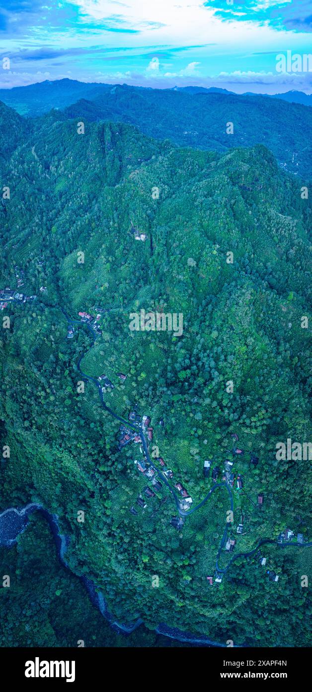 Aerial view Kabut Pelangi Waterfall in East Java. The waterfall stream ...