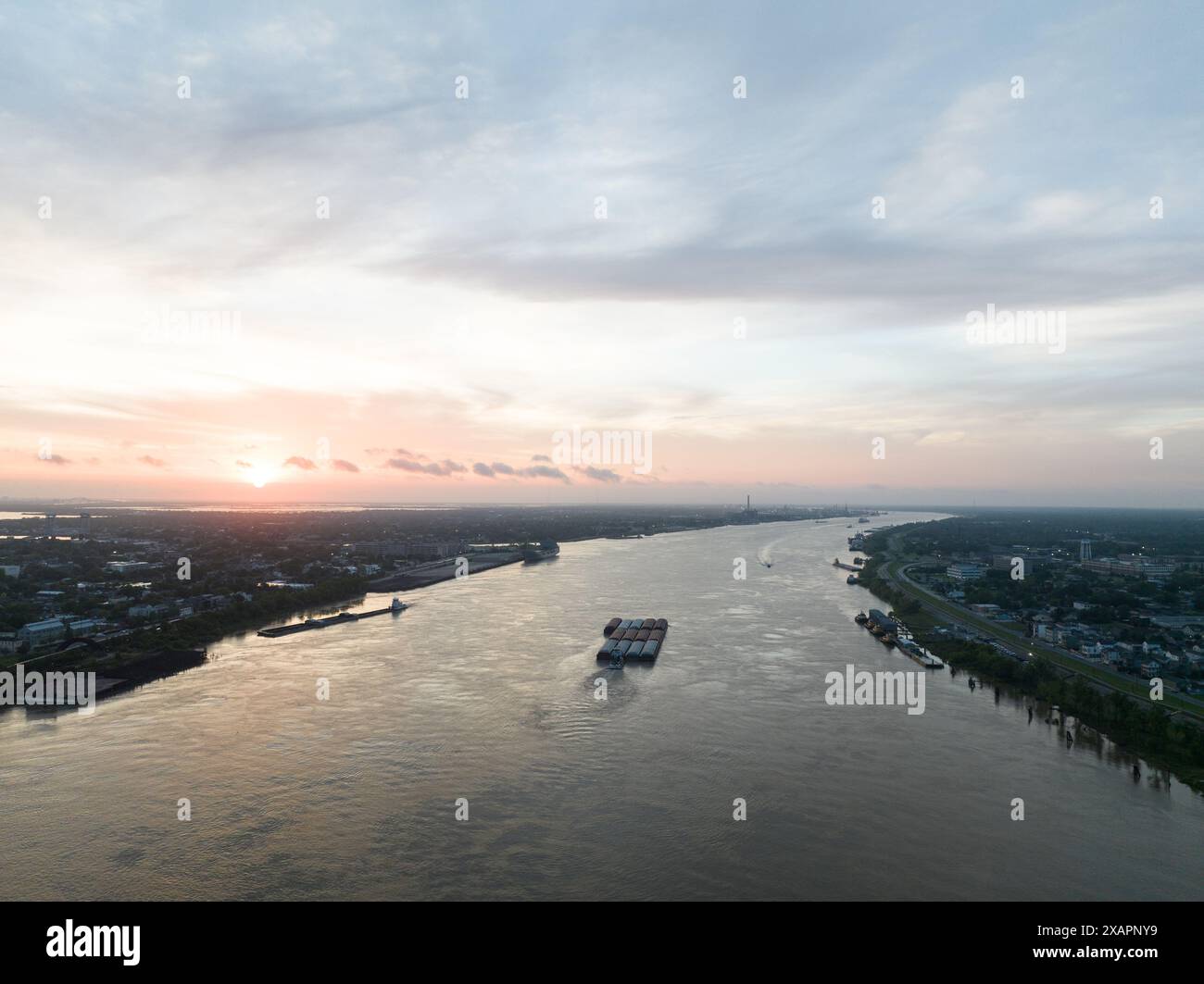 Aerial view of the Mississippi River at dawn near New Orleans, with a