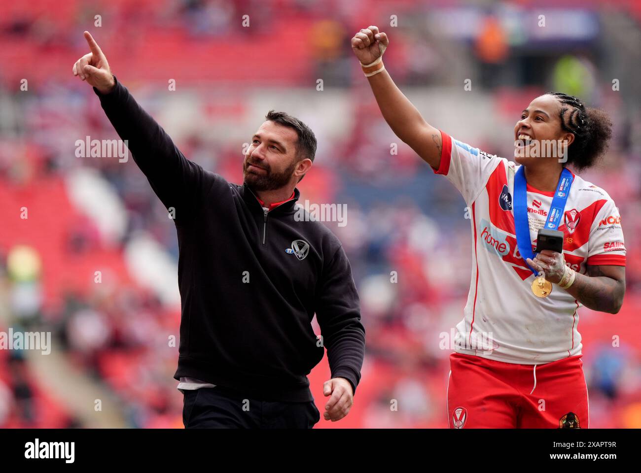 St Helens head coach Matty Smith (left) and St Helens' Chantelle Crowl ...