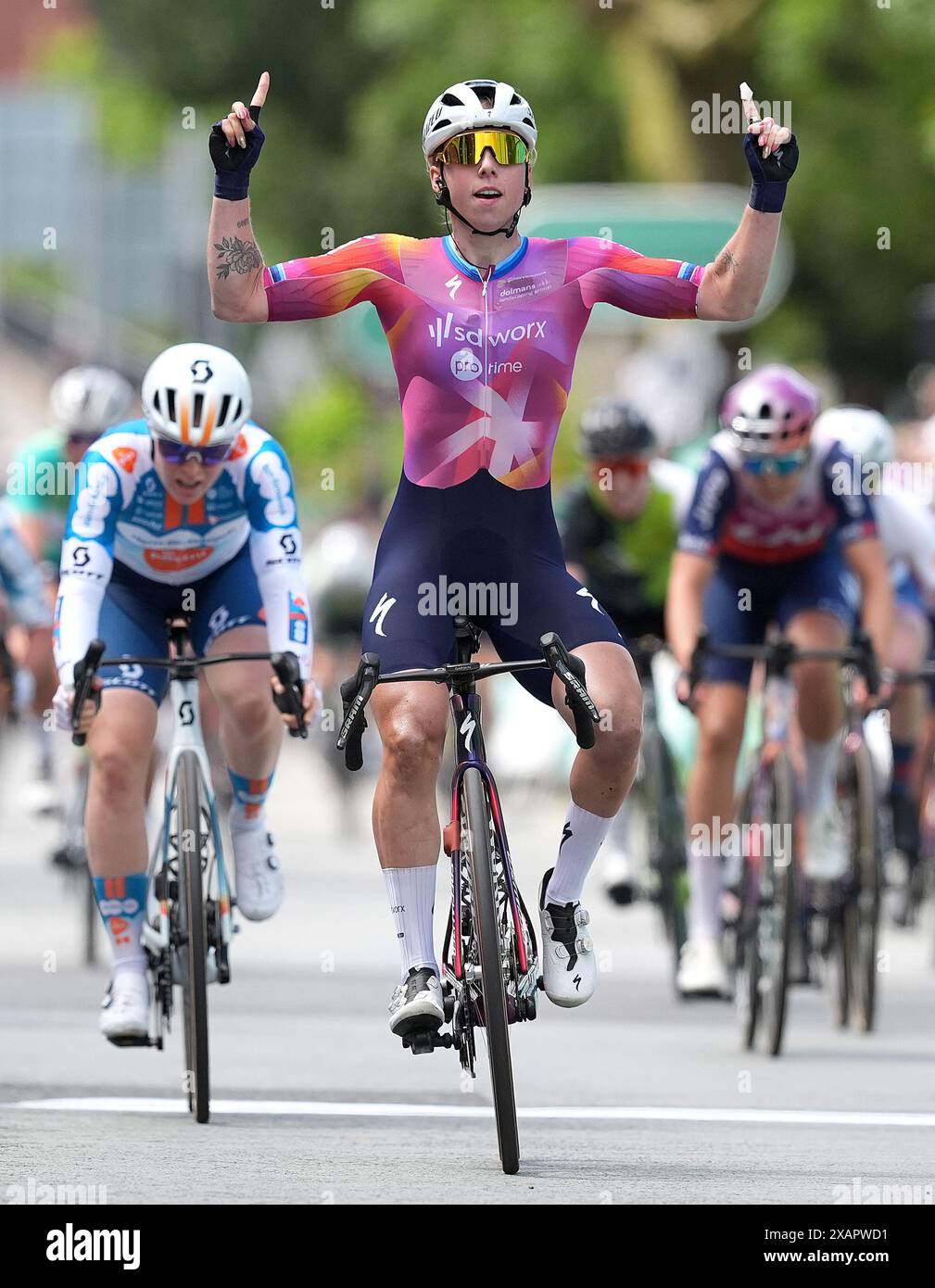 Lorena Wiebes (centre) of Team SD Worx Protime, celebrates winning