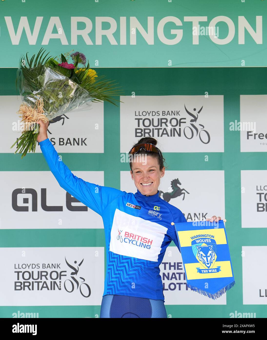Lizzie Deignan celebrates with the Queen of the Mountains jersey, after