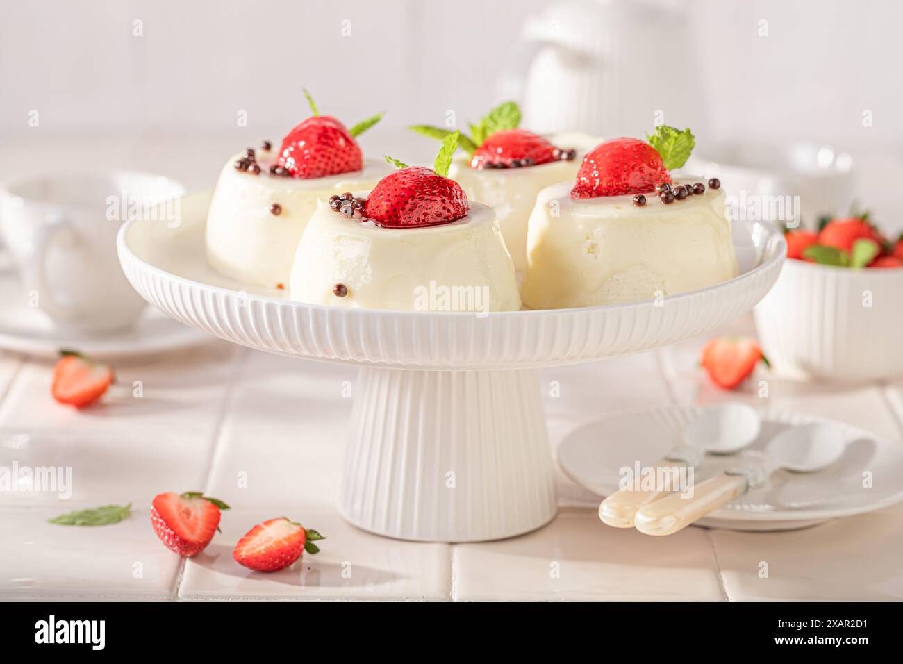 Sweet cheesecake monoportion with strawberries and vanilla glazed