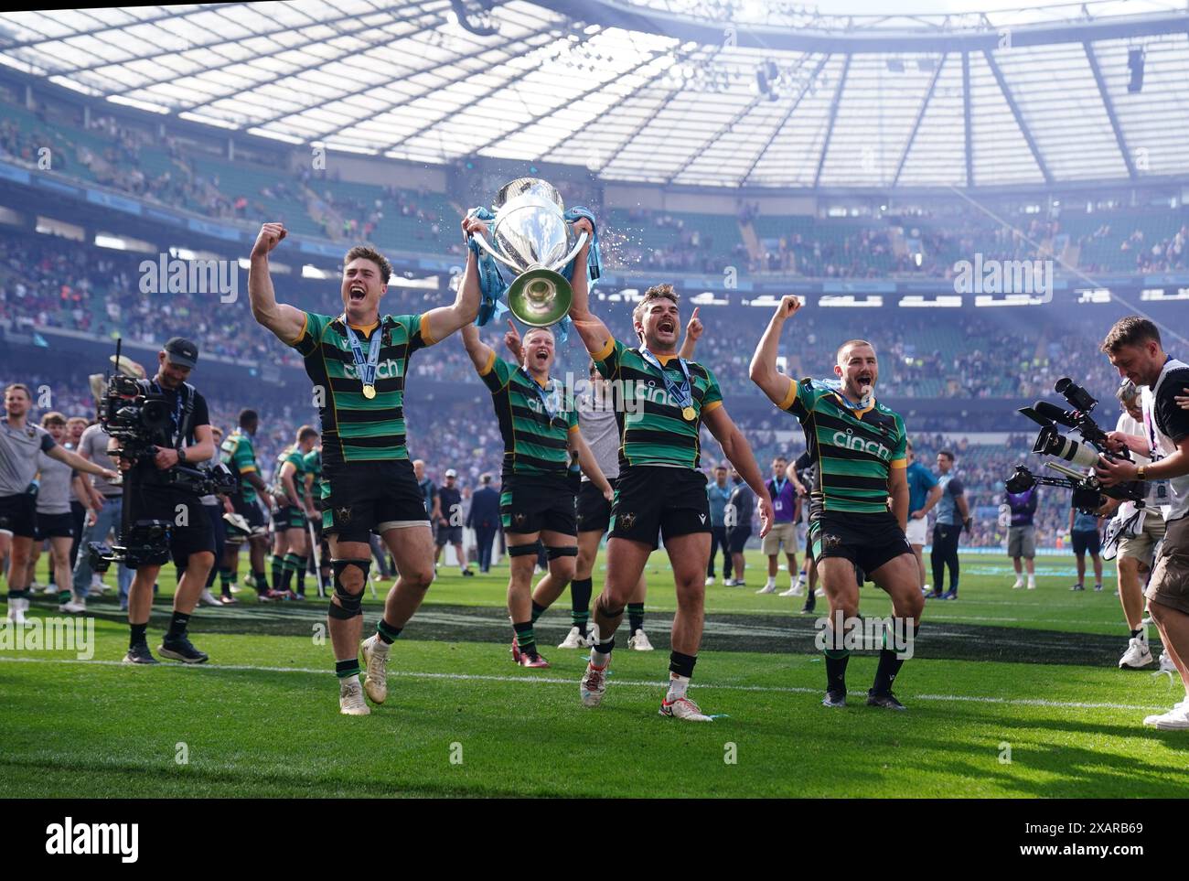 Northampton Saints Players Celebrate With The Trophy After Winning The northampton-saints-players-celebrate-with-the-trophy-after-winning-the