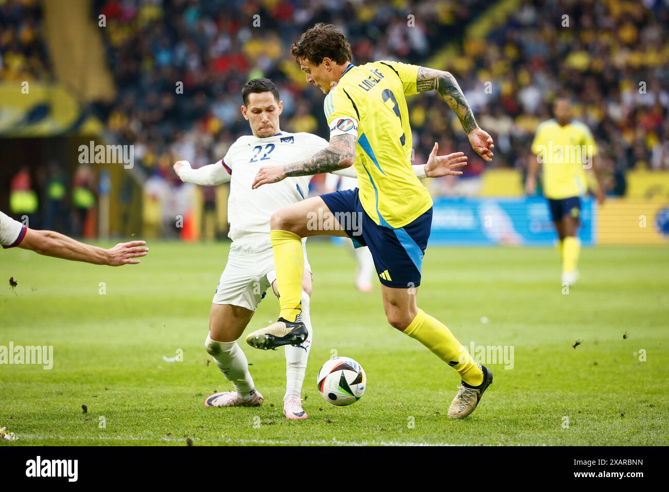 Stockholm, Sweden. 08th June, 2024. STOCKHOLM, SWEDEN 20240608Serbia's Sasa Lukic (L) and Sweden's Victor Nilsson Lindelöf in action during an international friendly soccer match between Sweden and Serbia at Friends Arena in Stockholm, Sweden, on June 8, 2024. Photo: Stefan Jerrevång/TT/Code 60160 Credit: TT News Agency/Alamy Live News Stock Photo