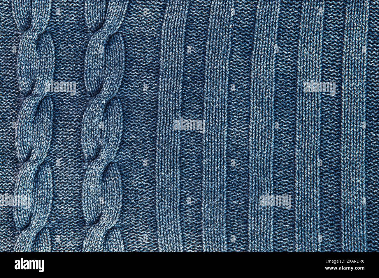Close-up of blue knitted fabric with twists Stock Photo