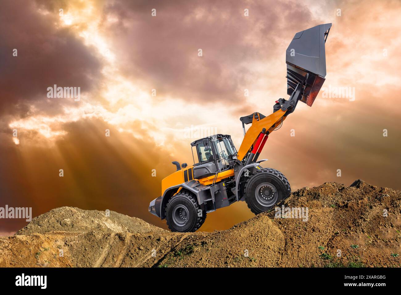 Ein Bagger arbeitet auf einer Baustelle Ein Bagger arbeitet an der ...