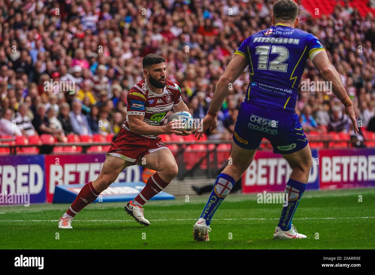 Wembley, London, UK. 8th June, 2024. Betfred Challenge Cup Final Rugby: Warrington Wolves Vs Wigan Warriors at Wembley Stadium. Abbas Miski looking for a gap in the Warrington defence. Credit James Giblin Photography/Alamy Live News. Stock Photo