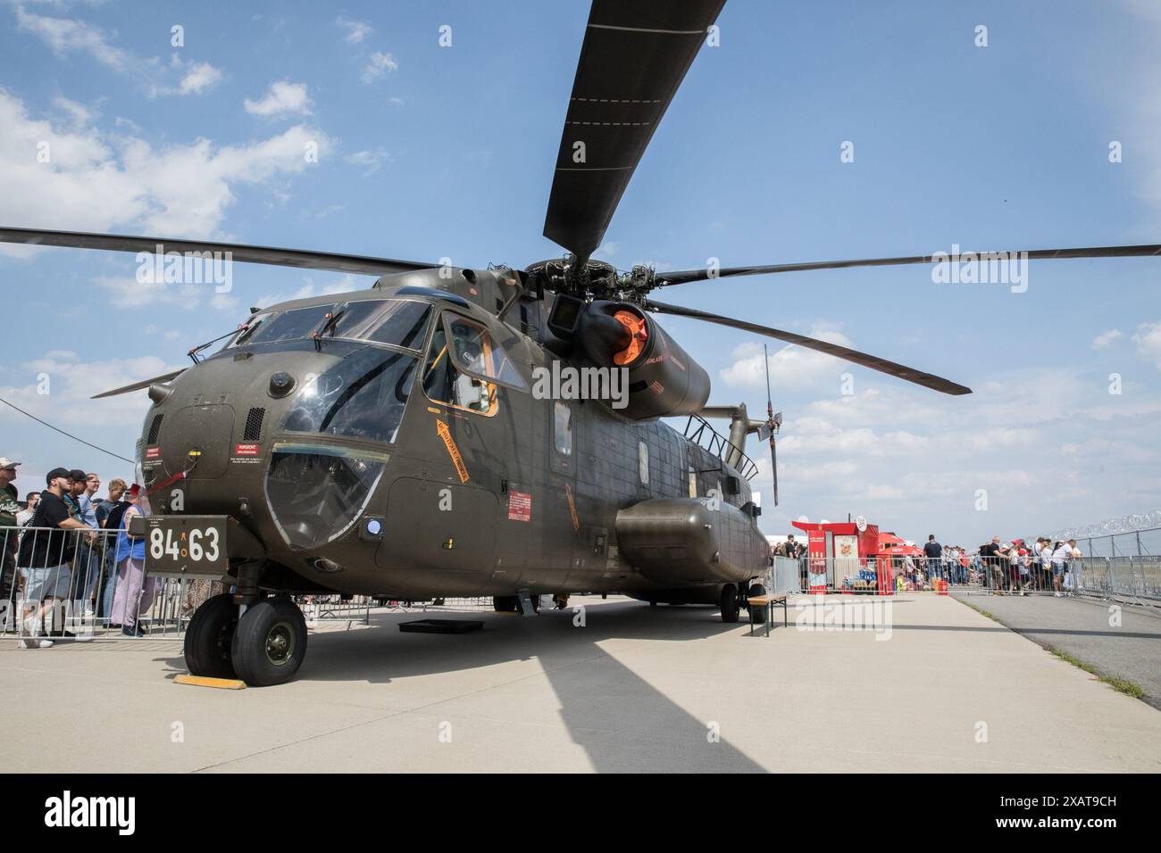 June 8, 2024, Berlin, Germany: The ILA Berlin 2024, one of the world's leading aerospace trade fairs, dazzled attendees with various military and civilian aircraft on June 8, 2024. The event, held at the Expo Center Airport near Berlin Brandenburg Airport (BER), saw sunny skies and a bustling crowd eager to witness the latest in aviation technology. Alongside the F-35, attendees could explore various other aircraft, including the Eurofighter, A400M transport plane, and cutting-edge drones and helicopters''‹. ILA Berlin 2024 also highlighted significant advancements in sustainable aviation tech Stock Photo