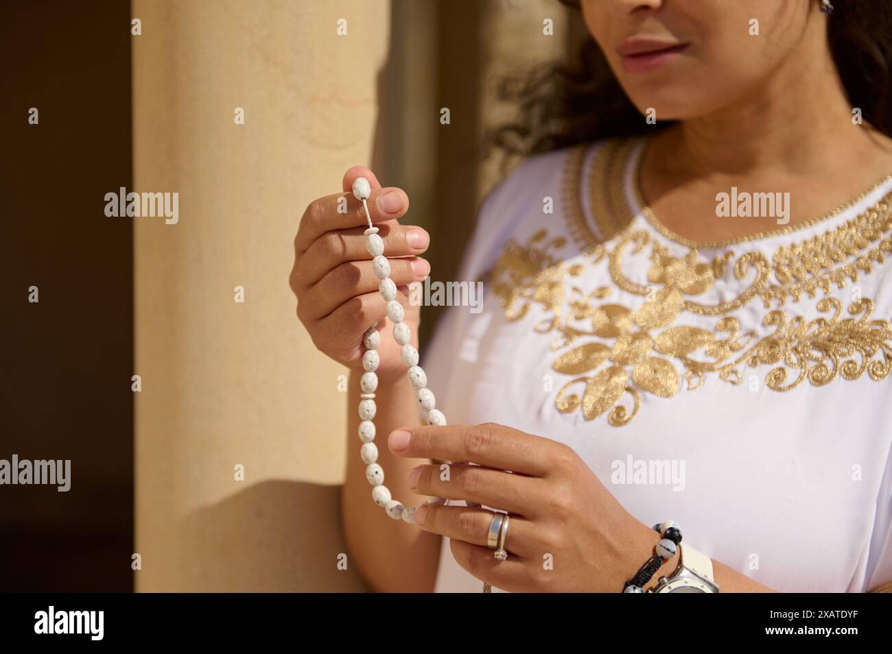 Woman holds rosary beads hi-res stock photography and images - Alamy