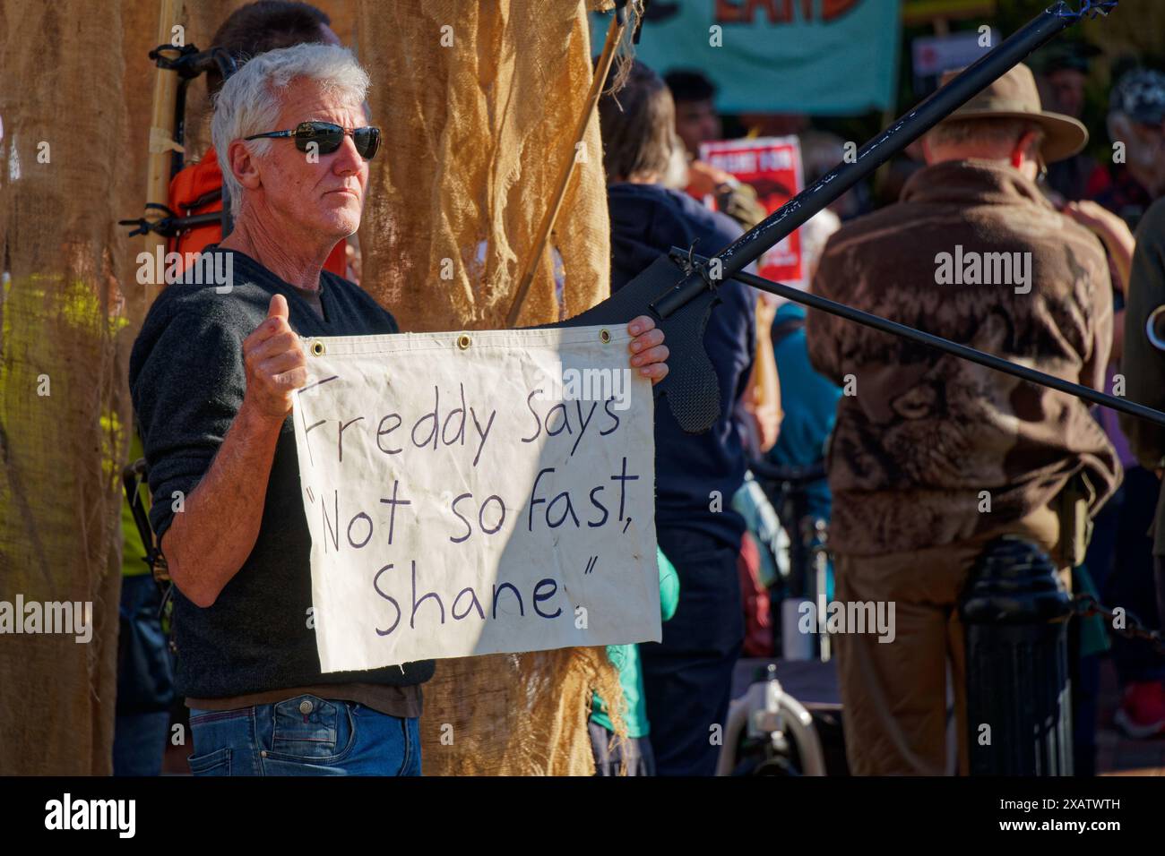 Nelson, south island, Aotearoa / New Zealand - june 8, 2024: A placard referencing a Shane Jones remark about making blind frogs extinct at the to pro Stock Photo