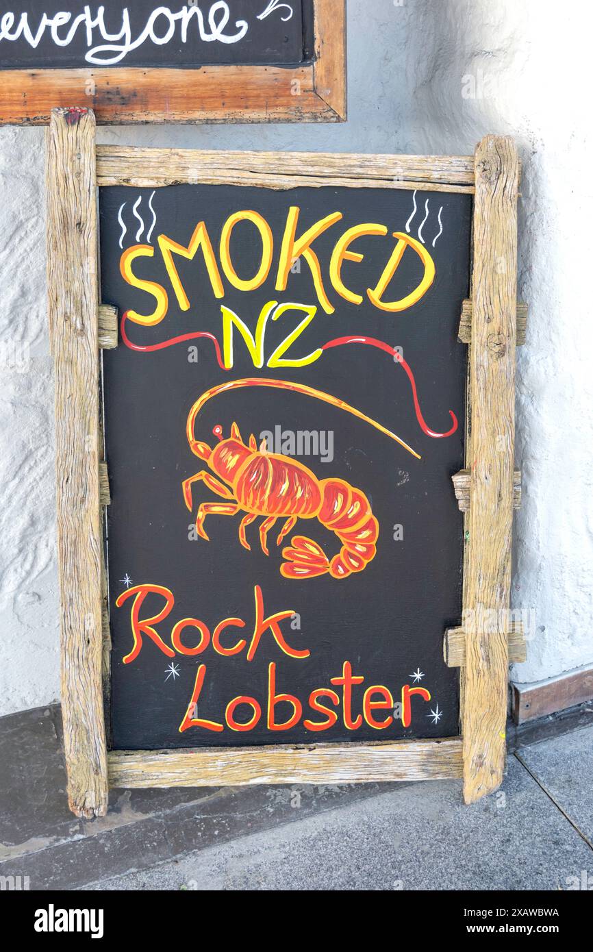 Smoked Rock Lobster seafood sign outside restaurant, Esplanade