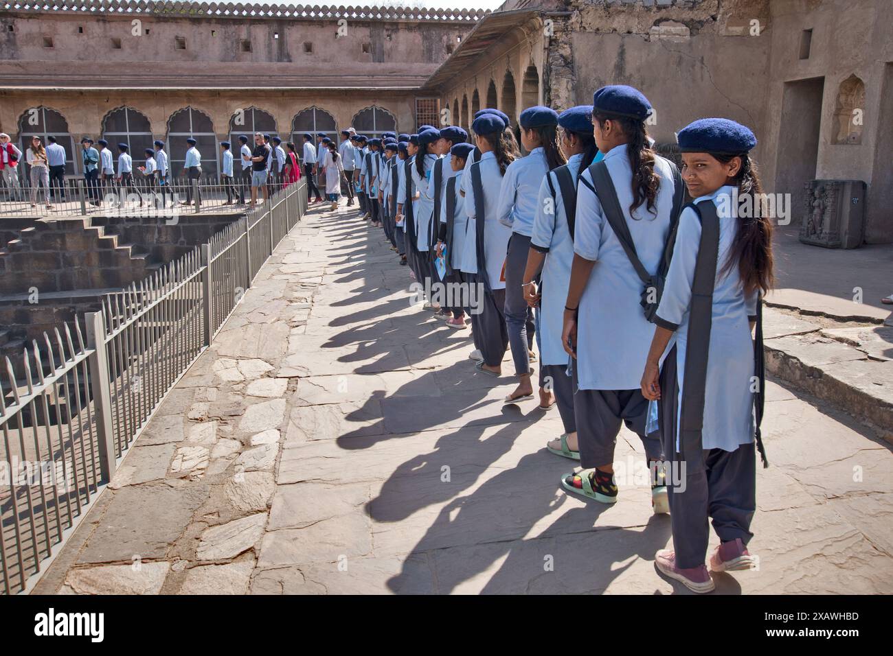 Patan, India: girls' class in school uniforms. Each school has its own design and there are usually several outfits, depending on occasion Stock Photo