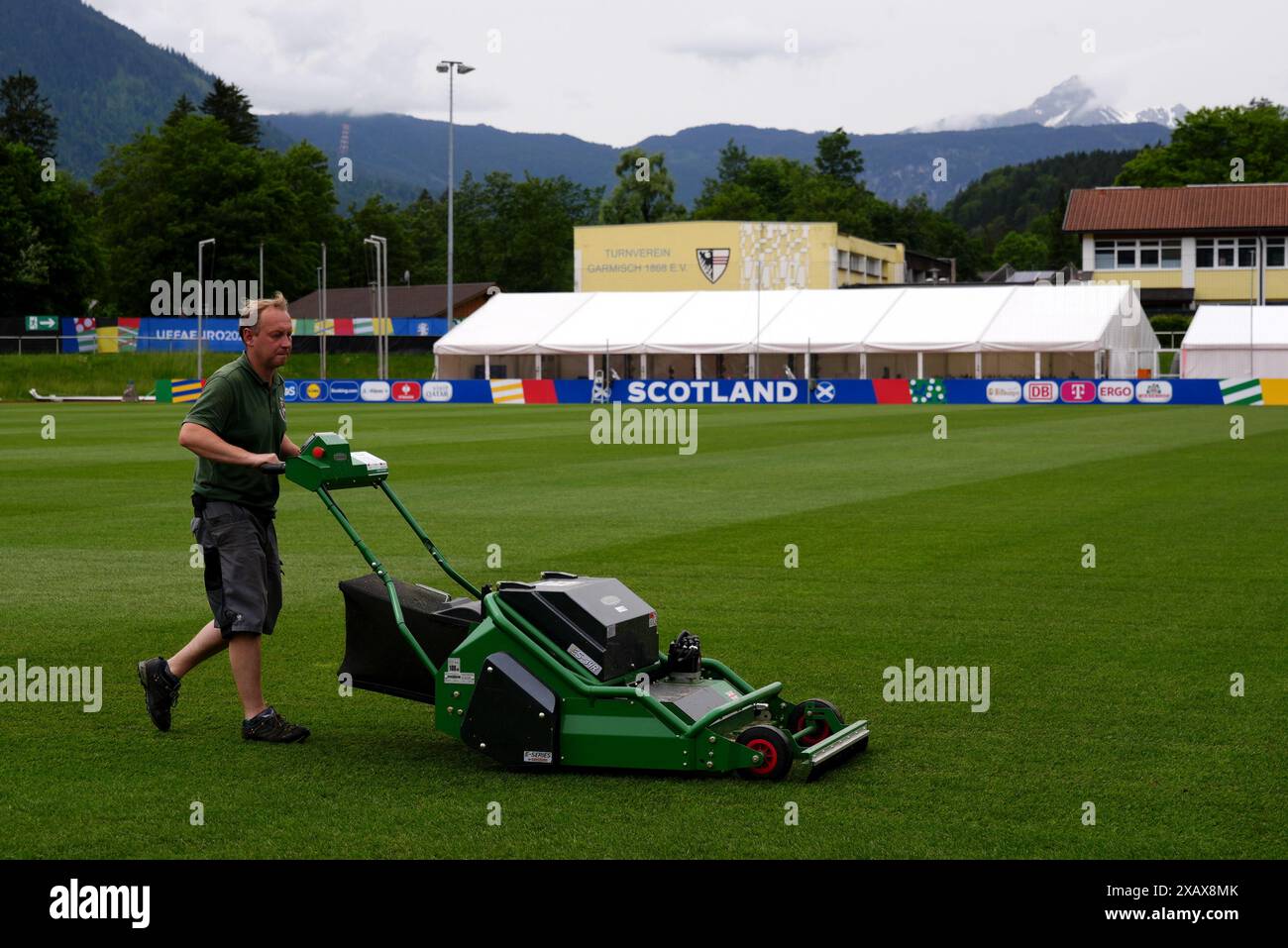 A groundsman prepares the facilities at Stadion am Groben, Scotland's training ground in