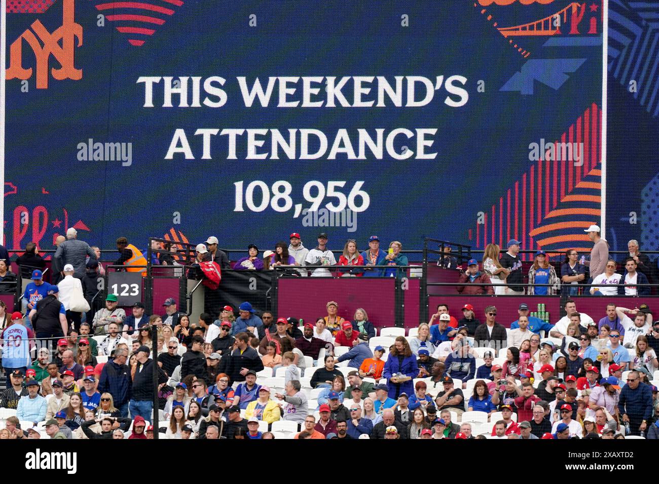 The grounds big screen displays the total attendance of 108,956 for ...