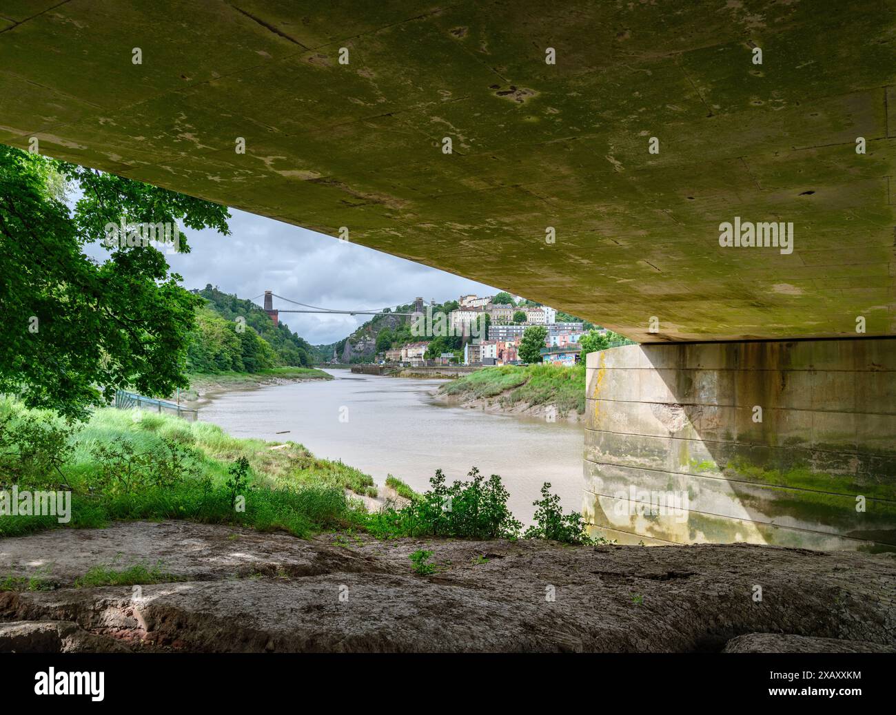 The Clifton Suspension Bridge and the Avon Gorge seen from under the Avon Bridge over the Cumberland Basin Bristol UK Stock Photo