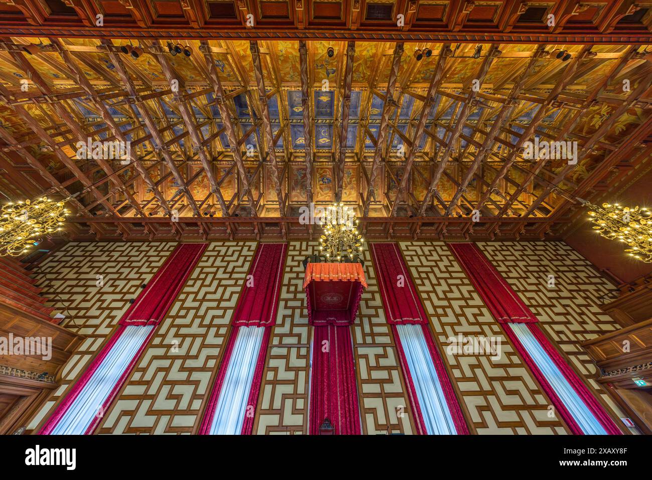 Council chamber in Stadshuset Stockholm. The town hall, completed in 1923, is the seat of the city government and the city parliament. The hall with its many original furnishings is used for weekly meetings. The chamber has 101 members. Since the 1970s, the proportion of women has been 50 percent. Stockholm City Hall (Stockholms stadshus). Waterside government offices completed in 1923 & made from red brick with a lantern-topped tower. Stadshusträdgården, Stockholm, Sweden Stock Photo