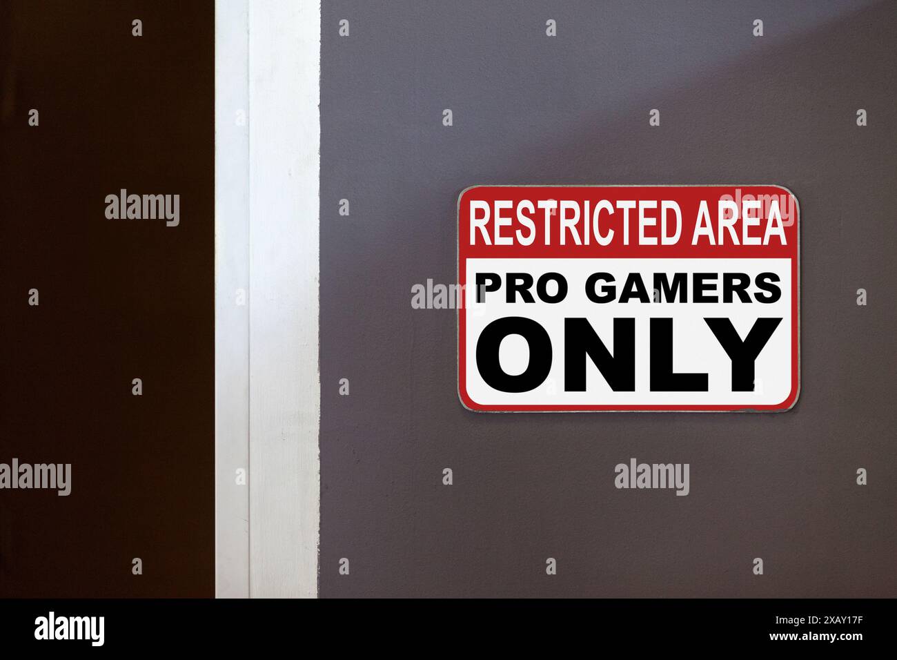 Red and white restricted area sign on the side of an open door stating ...