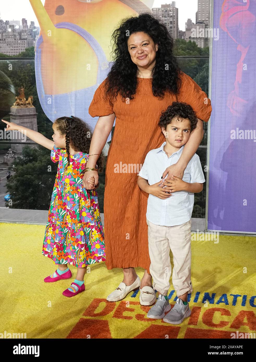 Hazel van der Most, Michelle Buteau and Otis van der Most attend the