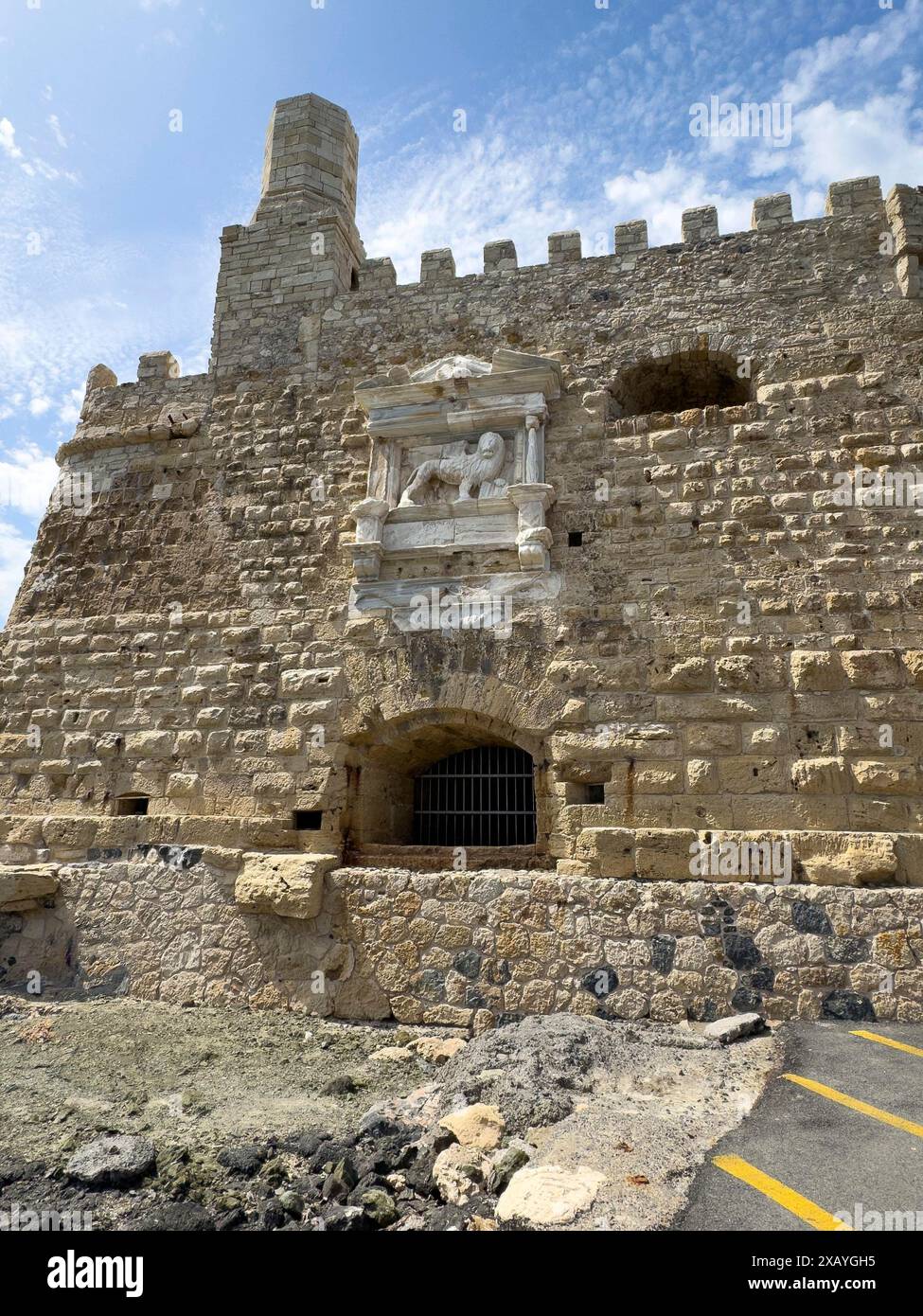 View from the harbour entrance to the sea-side outer wall of a fortress built in the Middle Ages 16th century by the Republic of Venice, old name Stock Photo