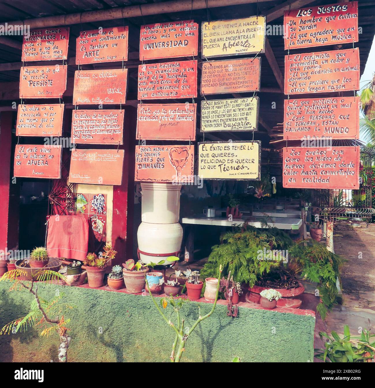 Wise sayings on tablets in front of a store in Cuba Stock Photo