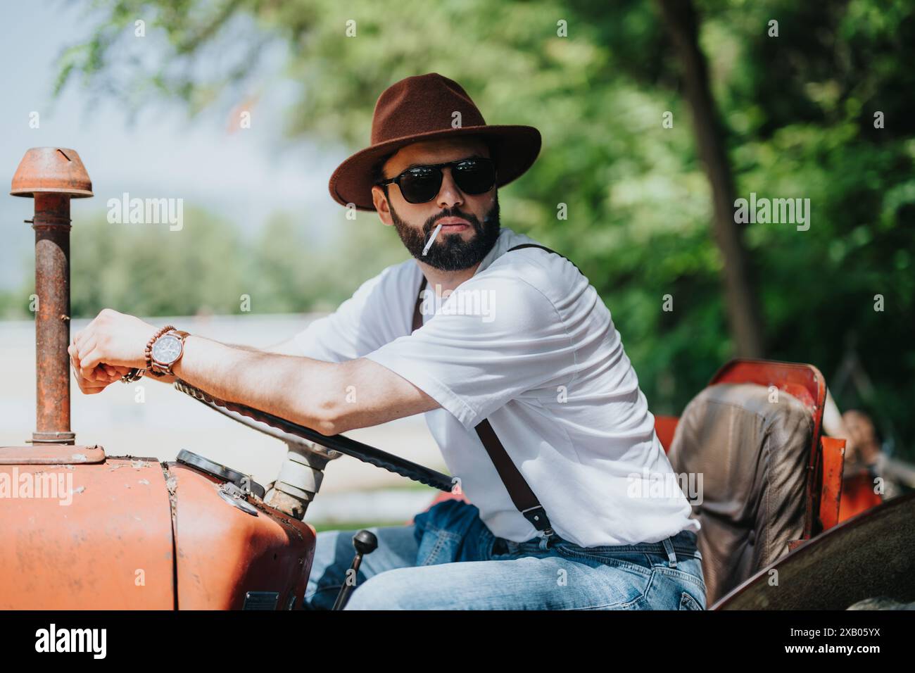 Elderly man driving retro hi-res stock photography and images - Alamy