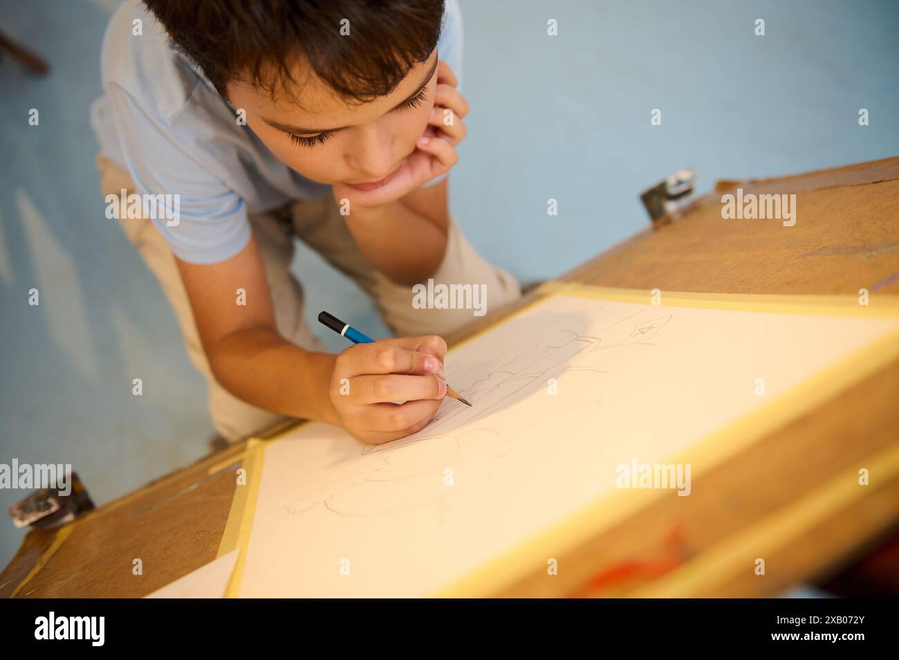 Kids have art class, drawing, painting with teacher in workshop. Young ...