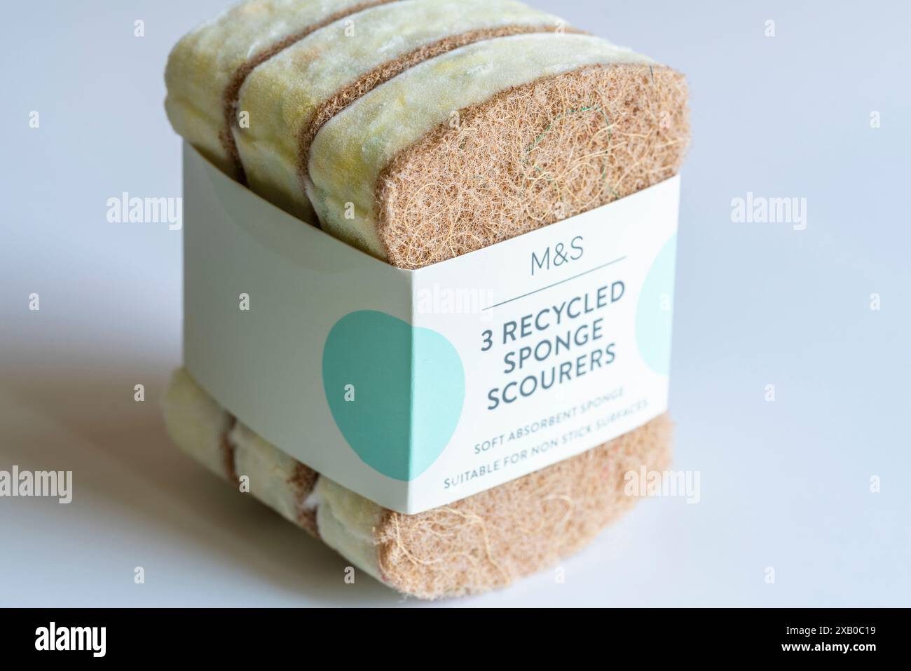Three recycled and environmentally friendly M&S sponge scourers Stock Photo
