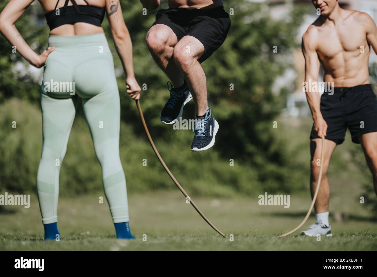 Group jumping skipping rope hi-res stock photography and images - Alamy