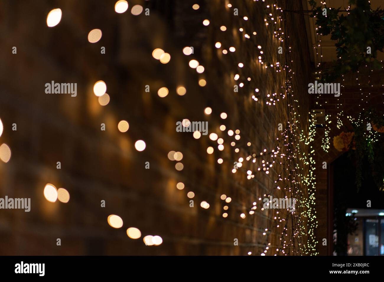 Blurred bokeh lights on yellow background Stock Photo