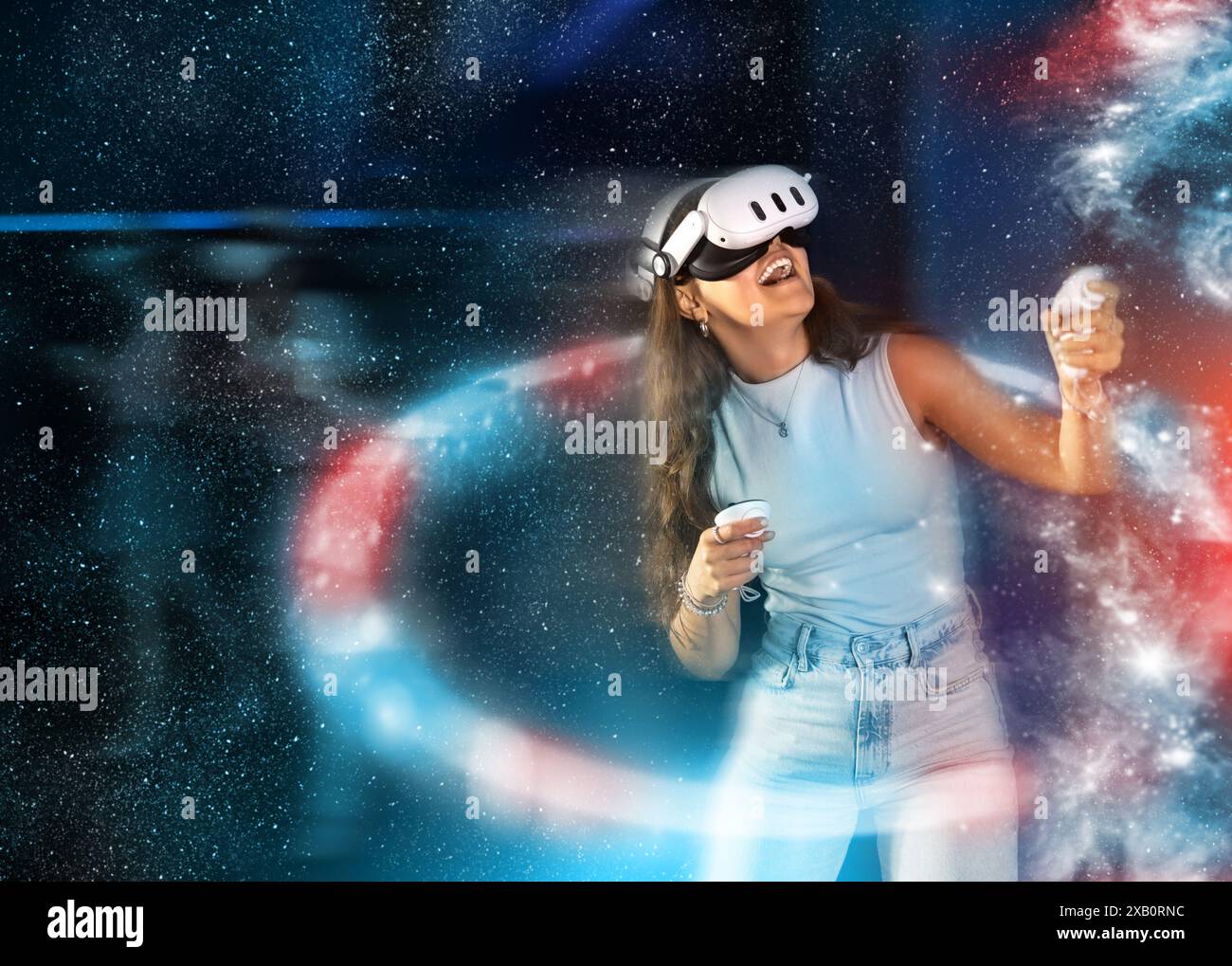 Young woman interacting with futuristic virtual reality environment ...