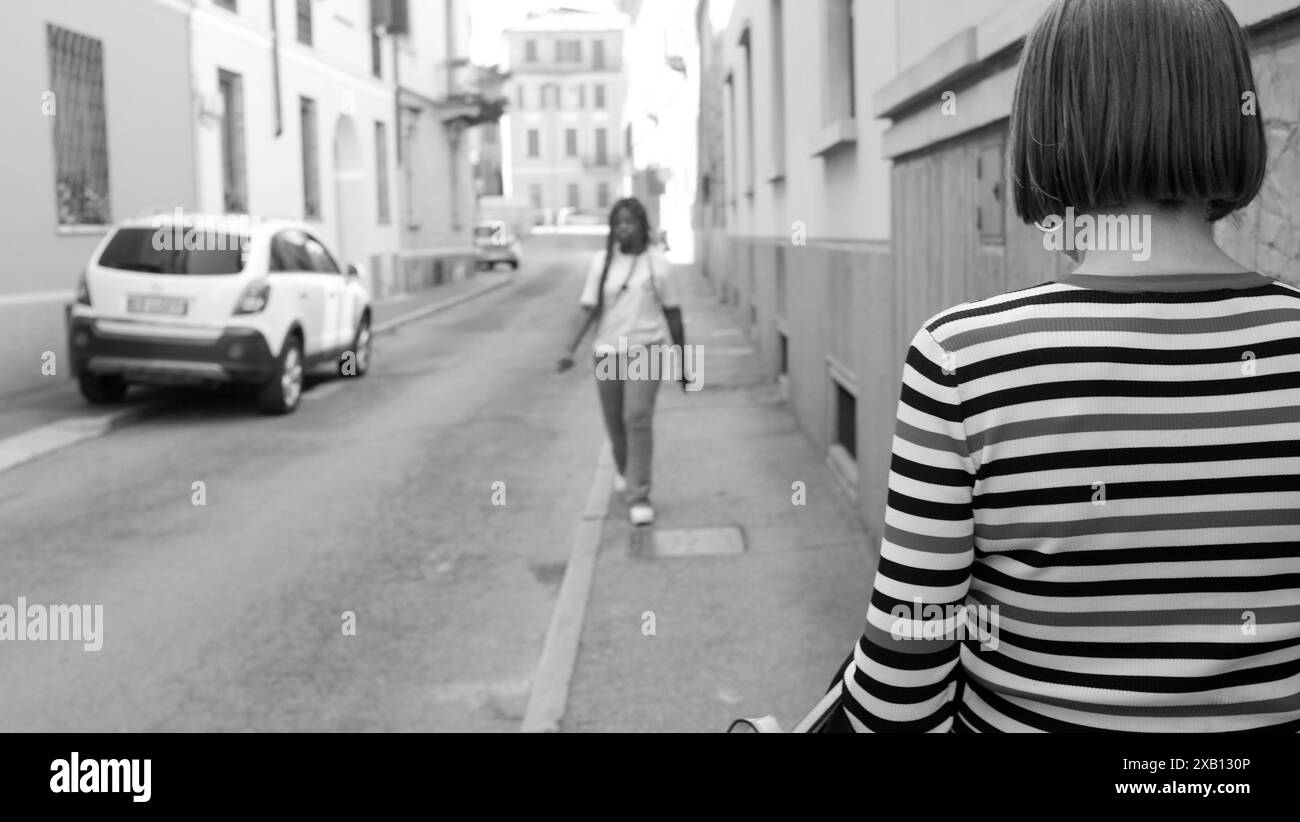 Two People Walking Away Black And