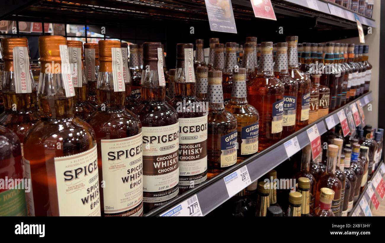 Coquitlam, BC, Canada June 08, 2024 Display sale of wine and whisky bottles in BC Liquor