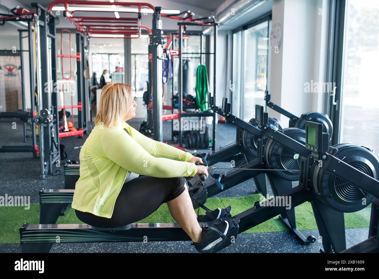 Overweight Rowing Indoor rowing centre hi-res stock photography and images - Alamy