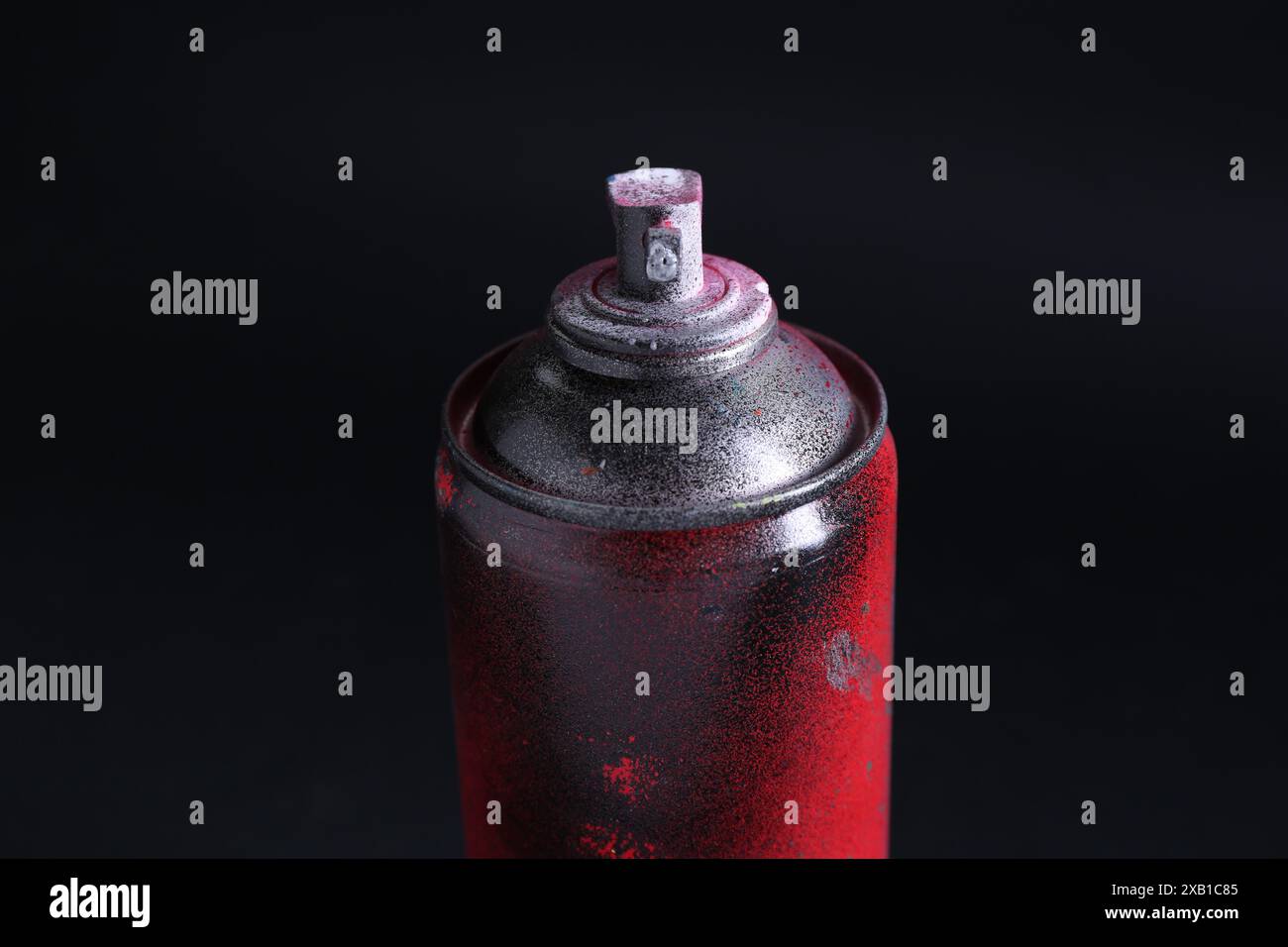 One spray paint can on dark background, closeup Stock Photo