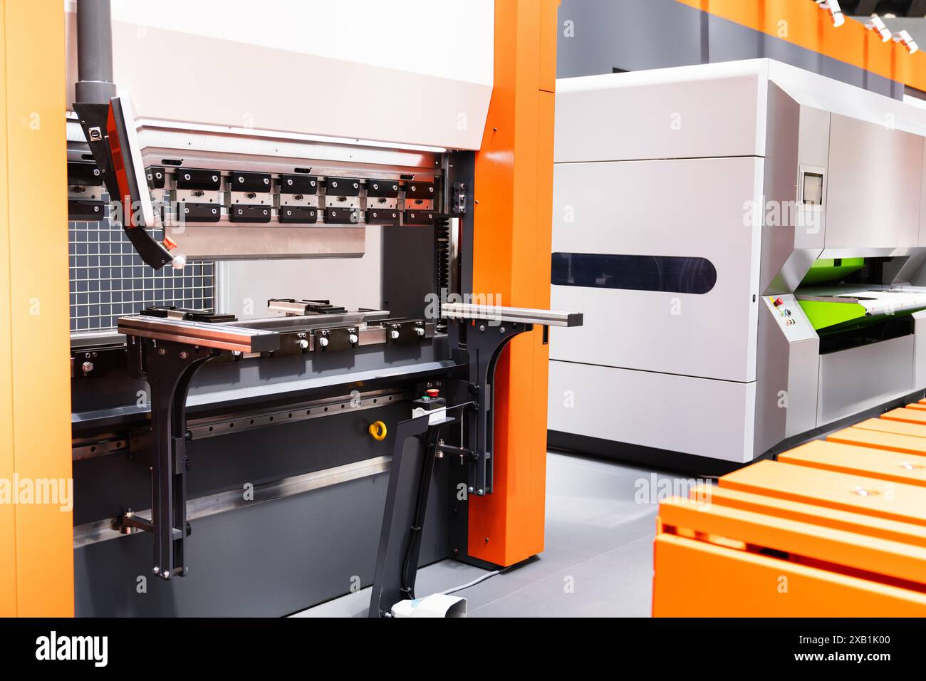 CNC mashine. Motorized maneuverable tool is controlled by a computer. Smart factory Stock Photo