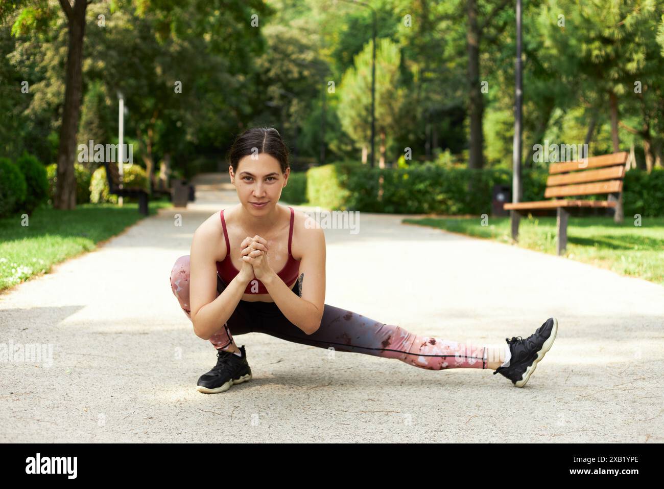 Woman runner legs stretching hi-res stock photography and images - Alamy