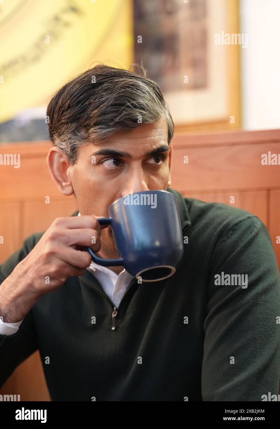 Prime Minister Rishi Sunak attends a neighbourhood watch meeting at the