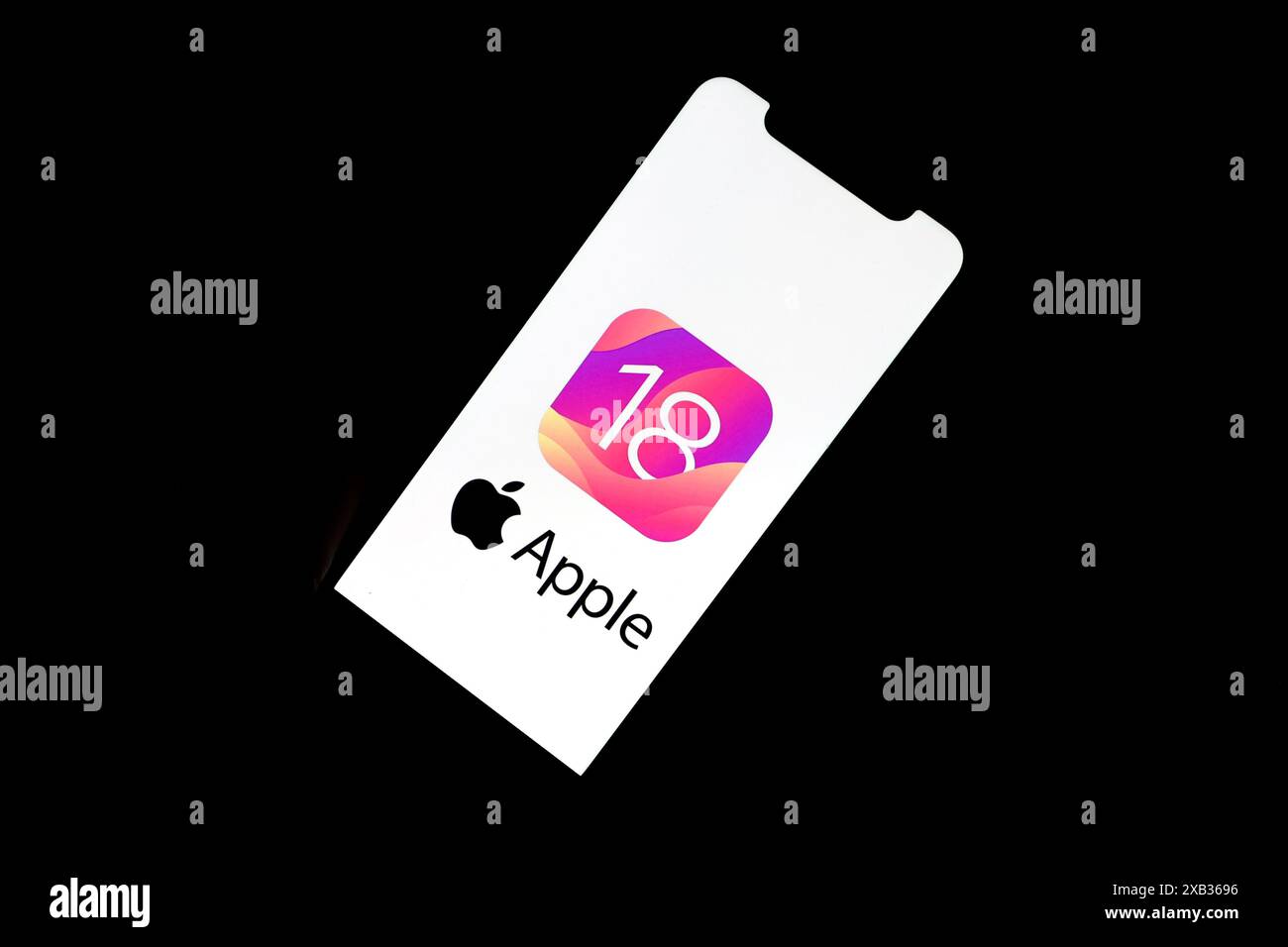 In this photo illustration a Apple iOS 18 logo seen displayed on an ...