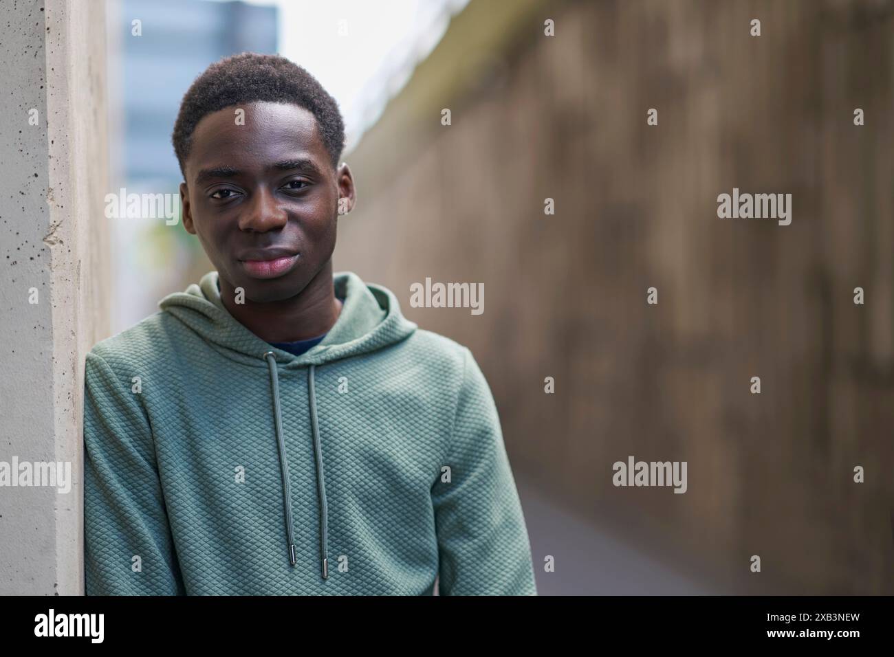 Portrait Of Teenage Boy In Concrete Urban City Setting Stock Photo - Alamy