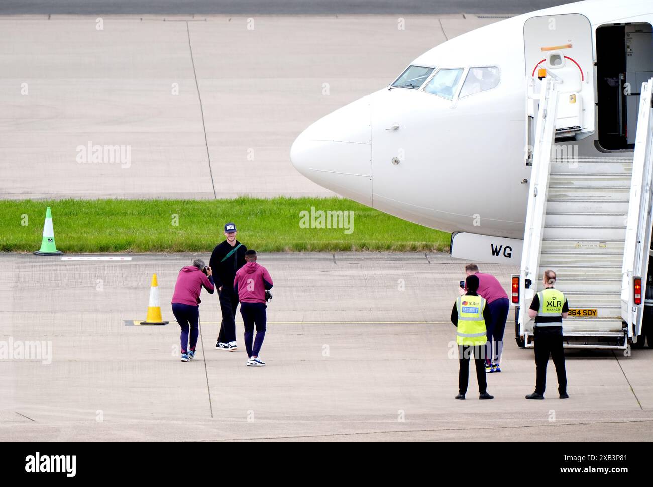England's Declan Rice prepares to board a plane at Birmingham Airport ...