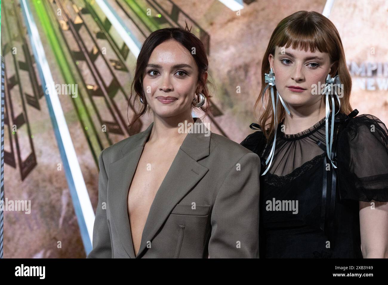 Phia Saban and Olivia Cooke attend ceremonial lighting of Empire State